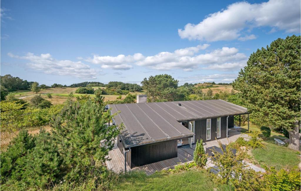 an overhead view of a house with a metal roof at Holiday Home Ebeltoft 18 in Ebeltoft