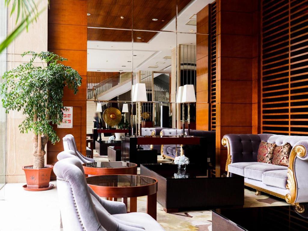 Χώρος καθιστικού στο Leisure Hotel