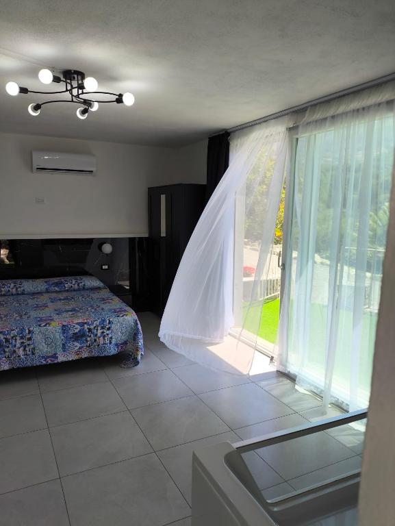 Postel nebo postele na pokoji v ubytování Bed & Breakfast Laino