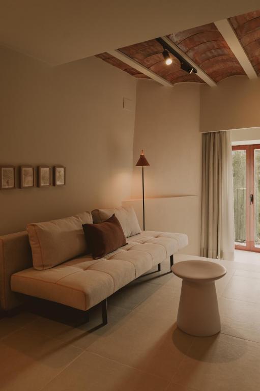 Posezení v ubytování Pau Suites