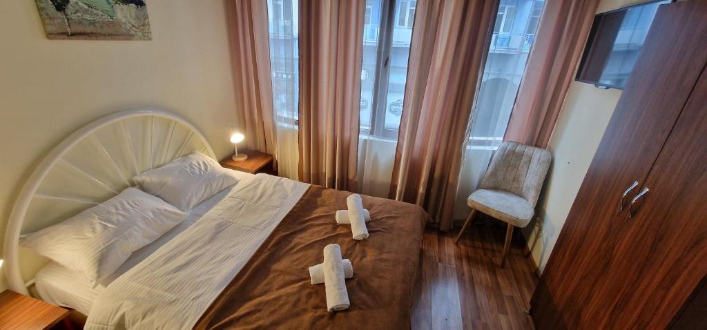 Postel nebo postele na pokoji v ubytování Karakum Batumi