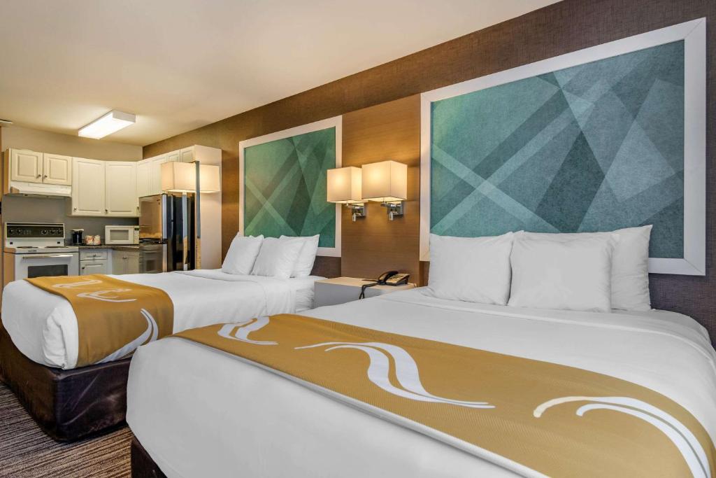 Postel nebo postele na pokoji v ubytování Quality Inn