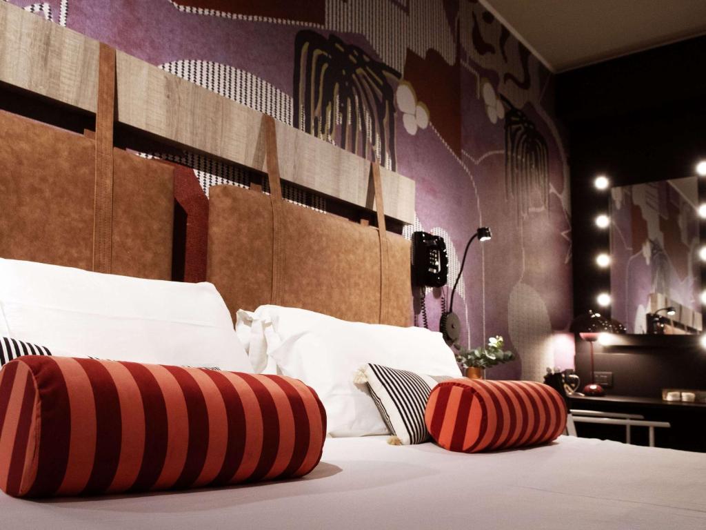 Letto o letti in una camera di Mercure Roma Cinecittà