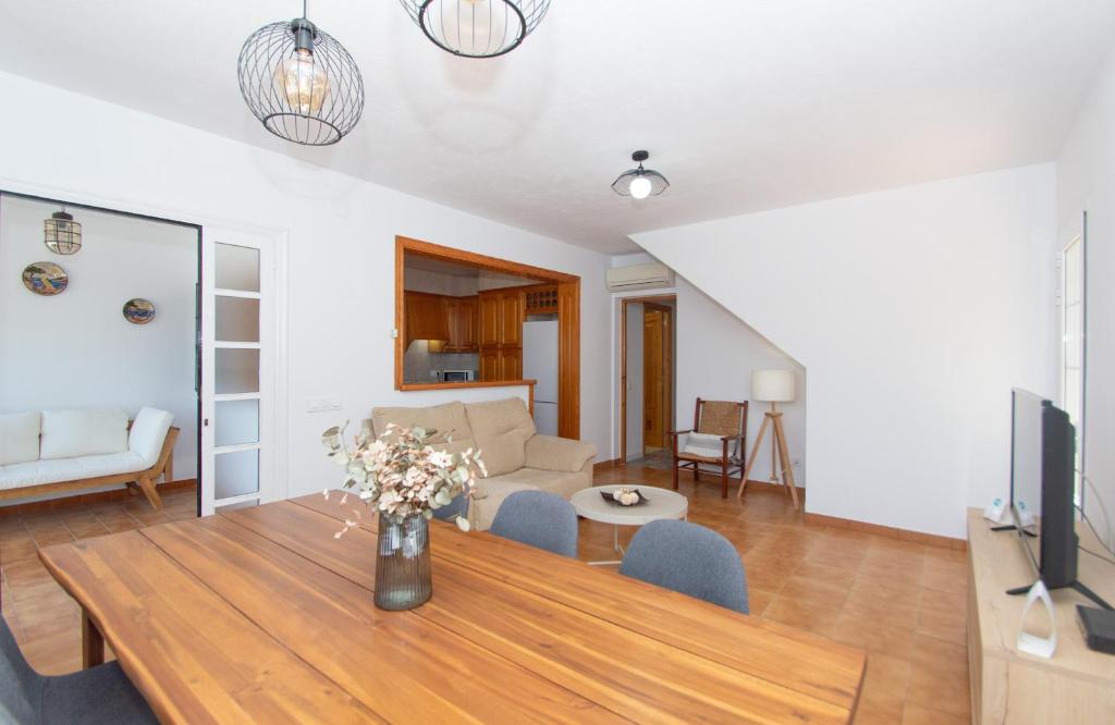 A television and/or entertainment centre at Villa Xaloc by Sonne Villas