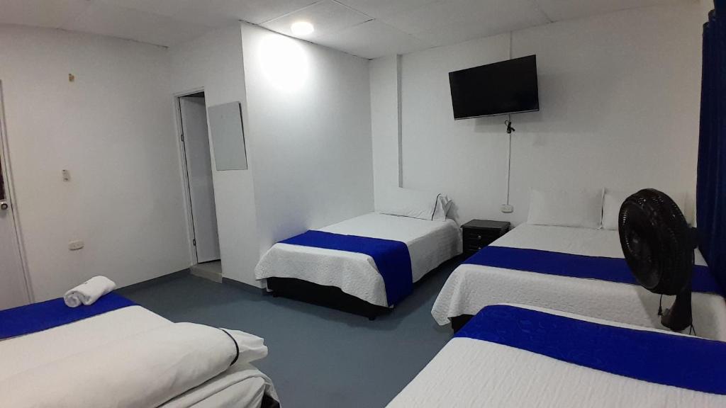 Postel nebo postele na pokoji v ubytování HOTEL LIGHT PLAZA