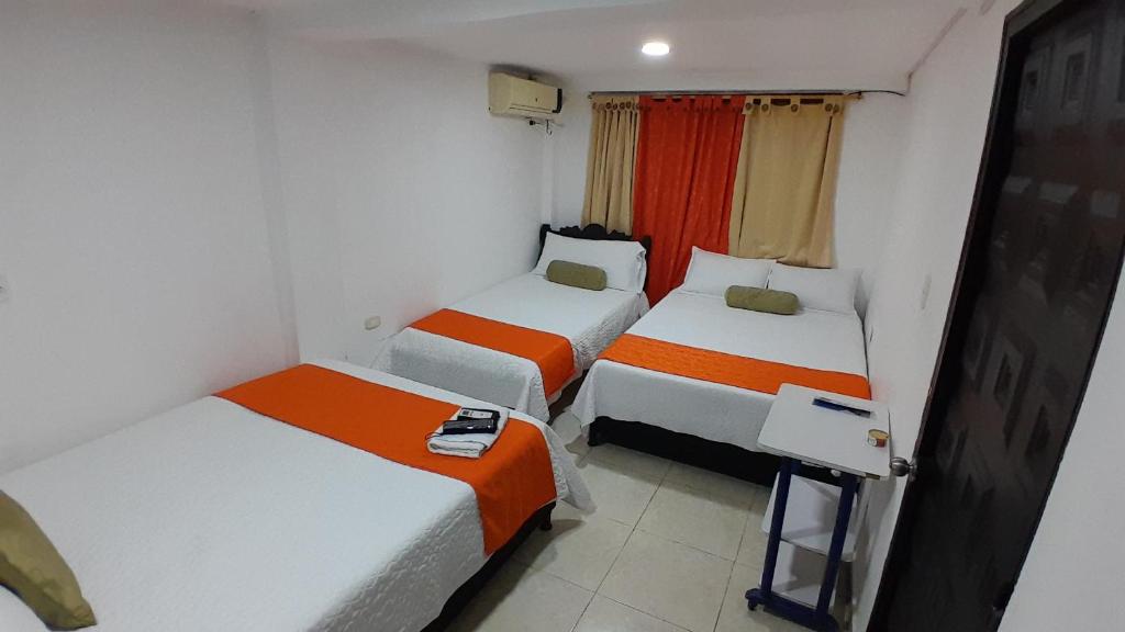 Postel nebo postele na pokoji v ubytování HOTEL LIGHT PLAZA