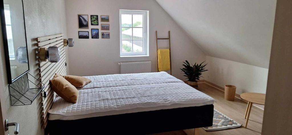 Postel nebo postele na pokoji v ubytování Groennebaek Bed and Breakfast