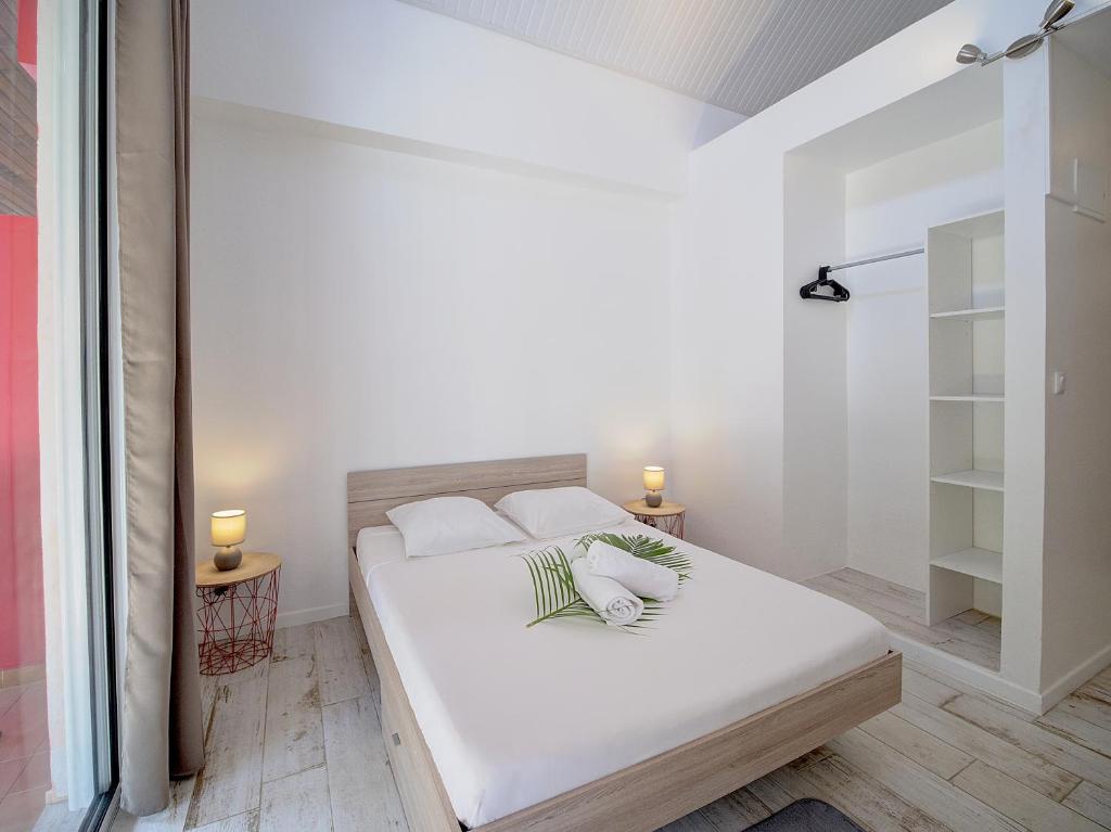 Postel nebo postele na pokoji v ubytování Résidence Ti'Kéol - Appartements avec terrasse 2 à 4 personnes, piscine