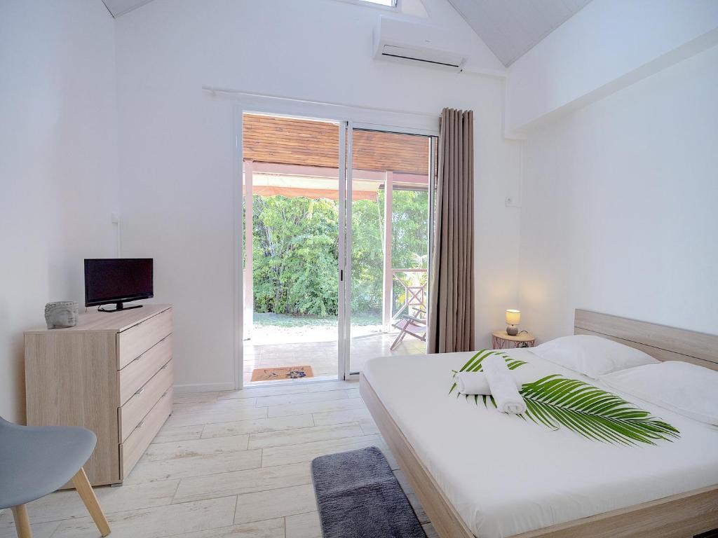Postel nebo postele na pokoji v ubytování Résidence Ti'Kéol - Appartements avec terrasse 2 à 4 personnes, piscine