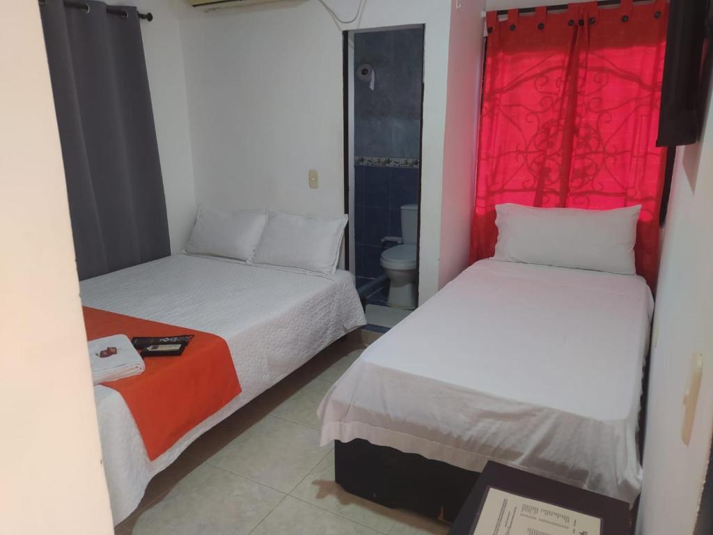 Postel nebo postele na pokoji v ubytování HOTEL LIGHT PLAZA