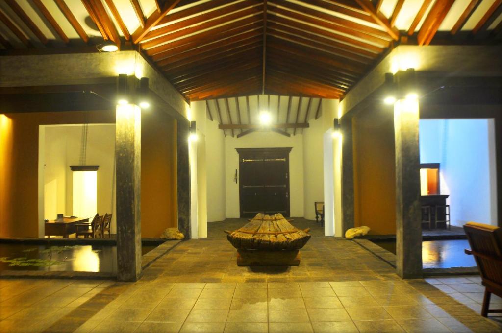a large room with a table in the middle of it at The Beach Cabanas Retreat & Spa in Koggala