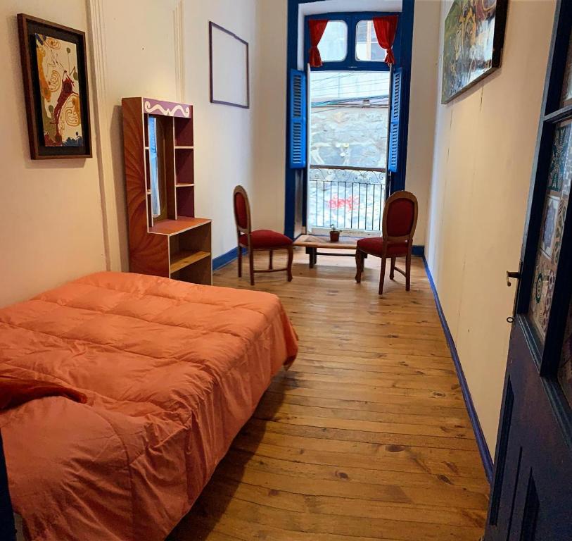 Uma cama ou camas num quarto em Art Hostel Casa Chaman