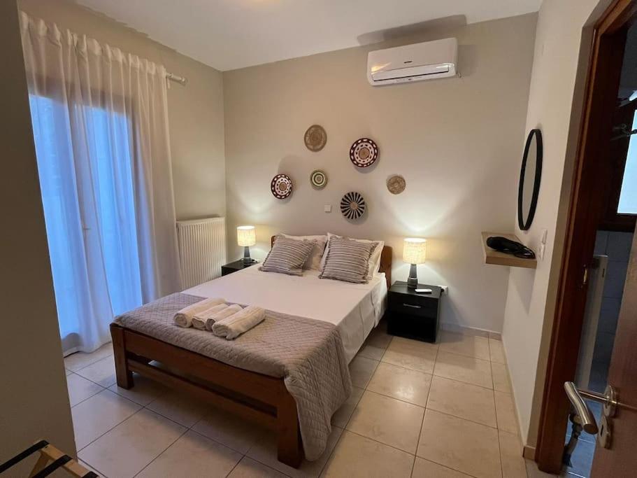 Postel nebo postele na pokoji v ubytování Coral Studio