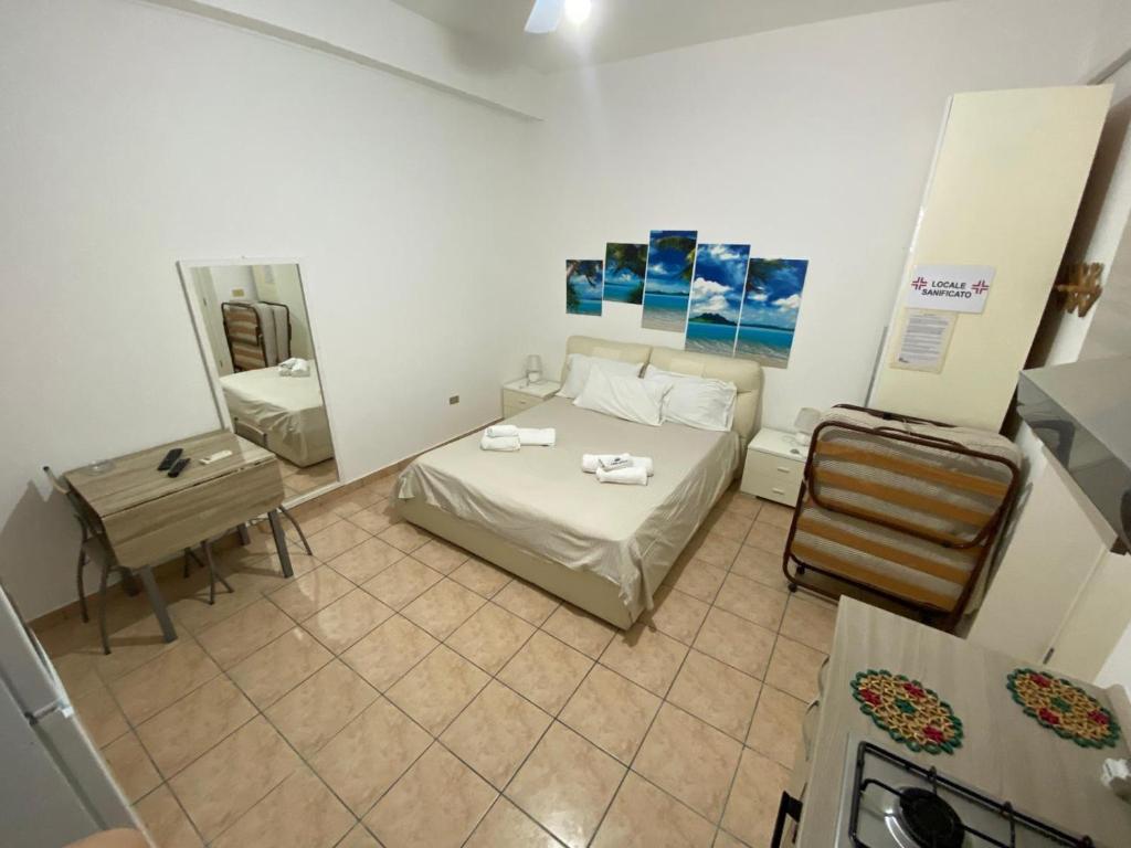 Postel nebo postele na pokoji v ubytování Zanella Bed