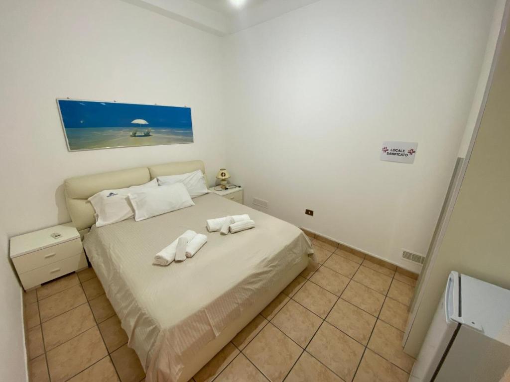 Postel nebo postele na pokoji v ubytování Zanella Bed