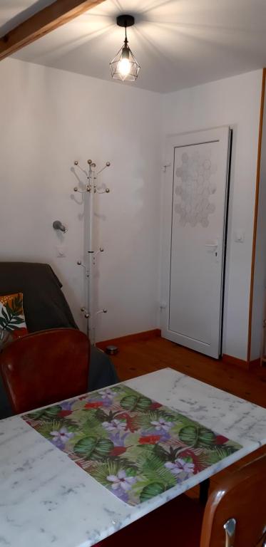 Postel nebo postele na pokoji v ubytování Chambre