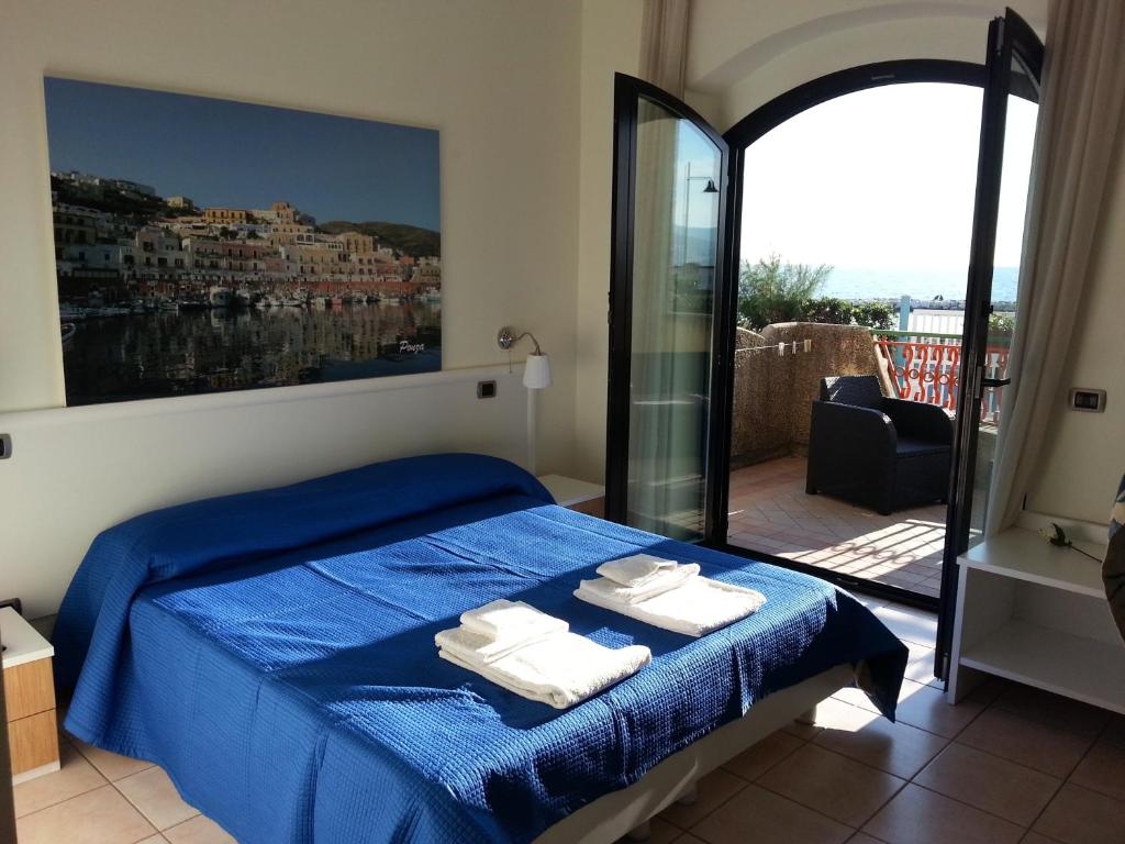 Postel nebo postele na pokoji v ubytování Hotel Tirreno Formia