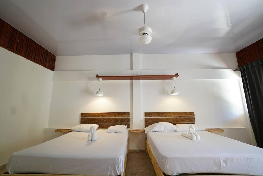Postel nebo postele na pokoji v ubytování Room #29 at Waterfront Playa Alicia