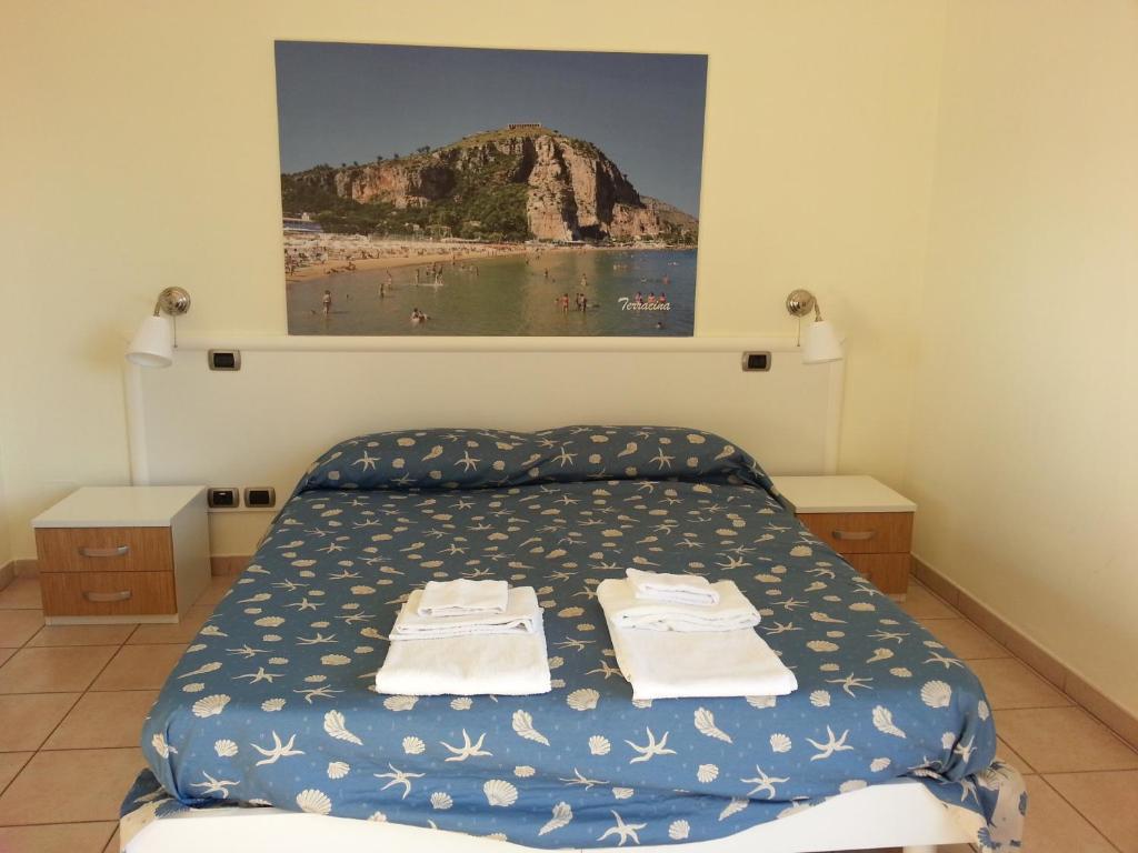 Postel nebo postele na pokoji v ubytování Hotel Tirreno Formia