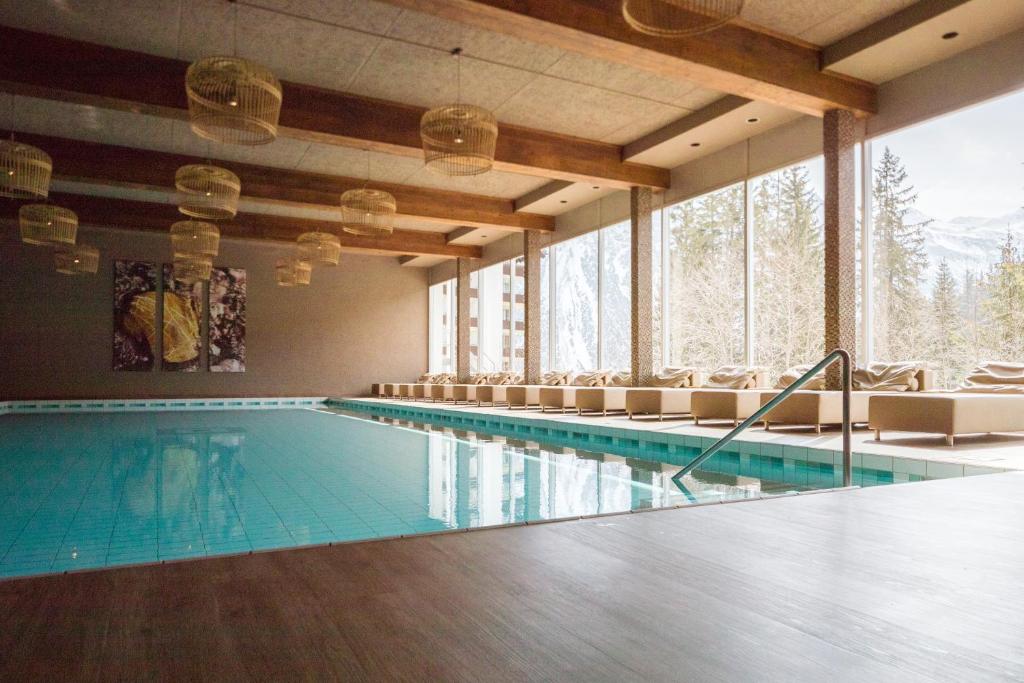 Bazén v ubytování AROSA ALPINE CLUB - Adults only nebo v jeho okolí