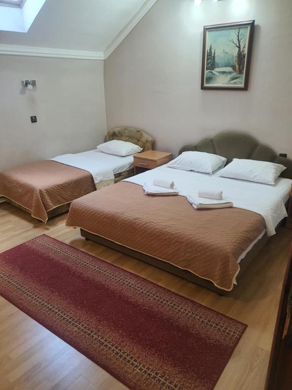 Postel nebo postele na pokoji v ubytování Guest house Vila Bor