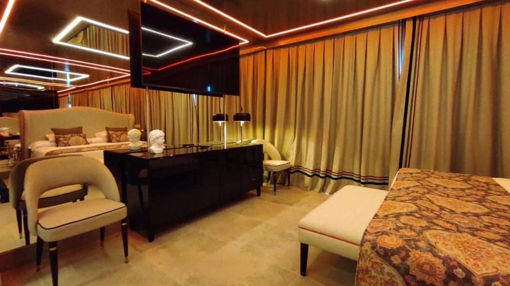 Кровать или кровати в номере Hotel Ritual Torremolinos- Adults Only