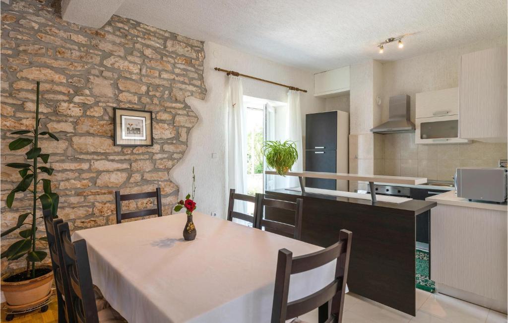 Kuchyň nebo kuchyňský kout v ubytování Holiday Home Marcana Filipana