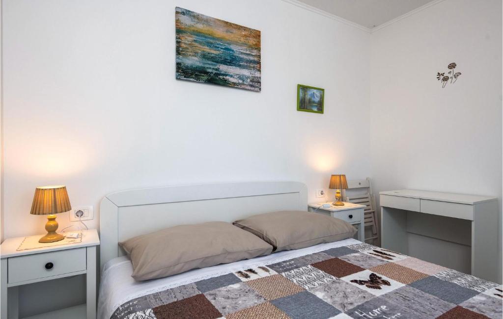 Postel nebo postele na pokoji v ubytování Holiday Home Marcana Filipana