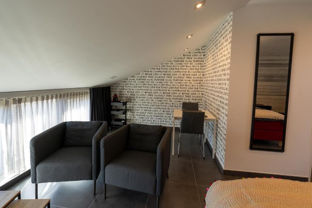 Posezení v ubytování B&B De Vlierbeek