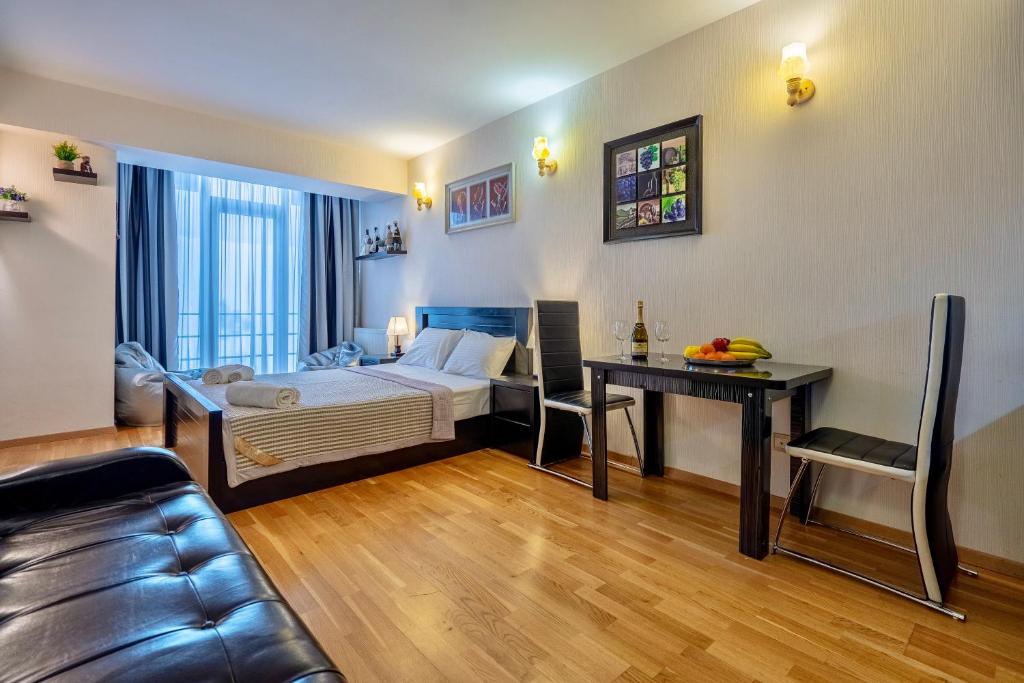 Postel nebo postele na pokoji v ubytování GVC New Gudauri Apartments