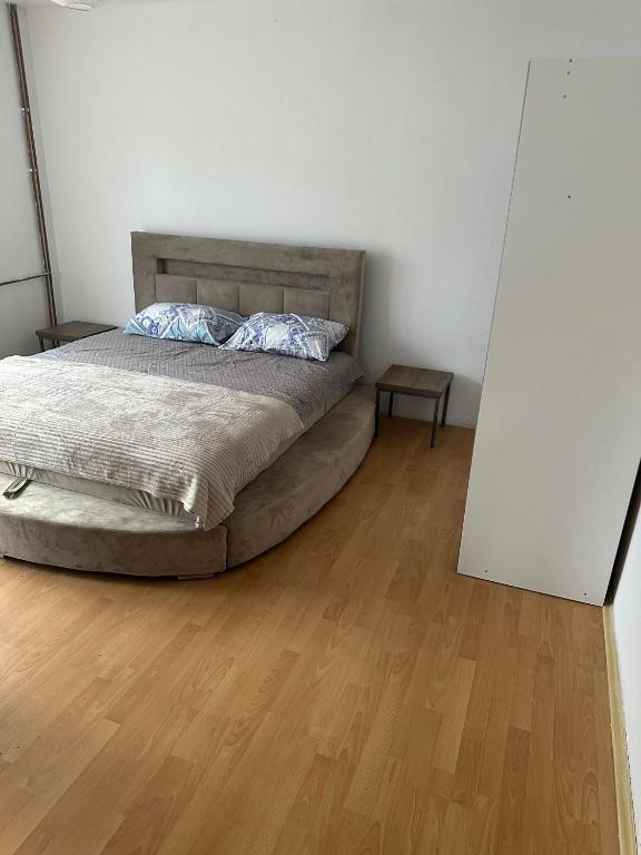 Postel nebo postele na pokoji v ubytování Apartmani Fenix
