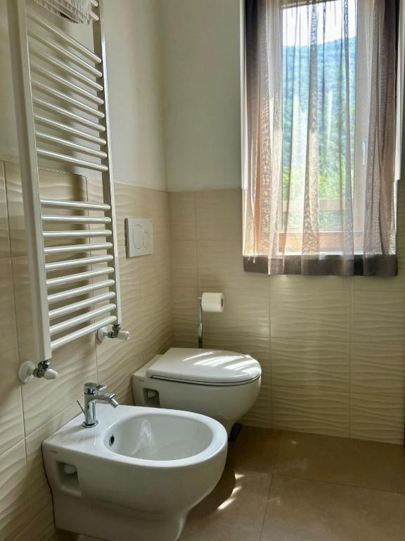 Koupelna v ubytování Hotel Maloia
