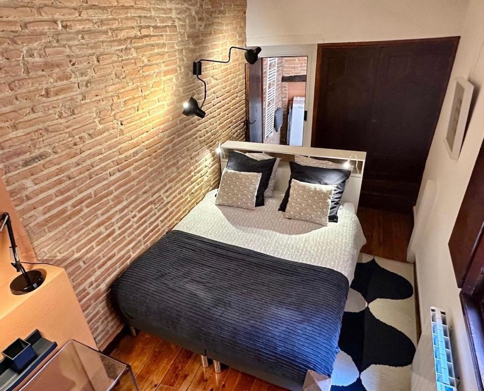Postel nebo postele na pokoji v ubytování La Tour Croix Baragnon