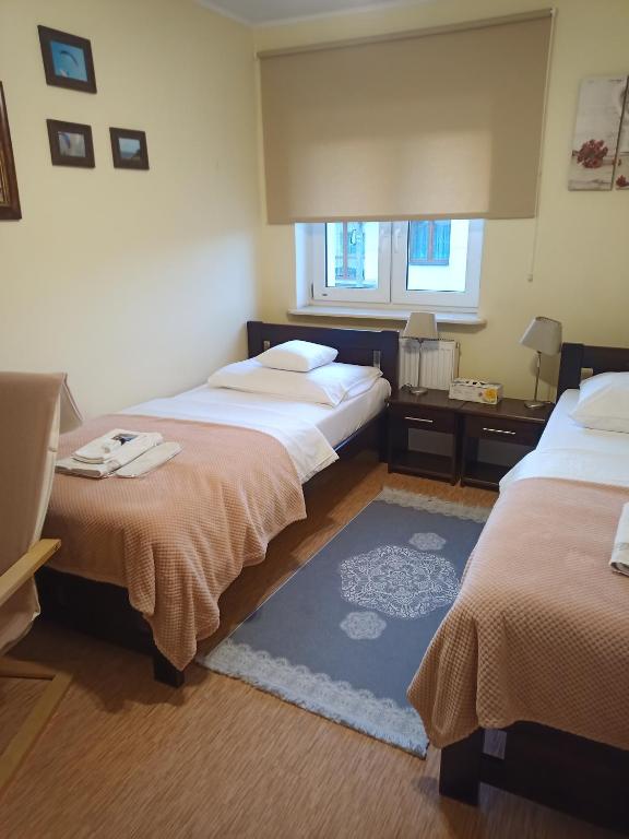 Postel nebo postele na pokoji v ubytování Pod Skrzydłami Podlasia