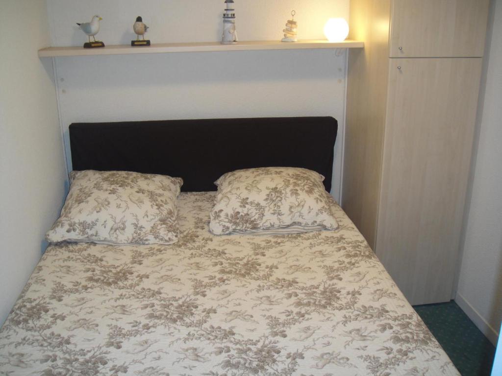 Postel nebo postele na pokoji v ubytování Residence Front De Mer
