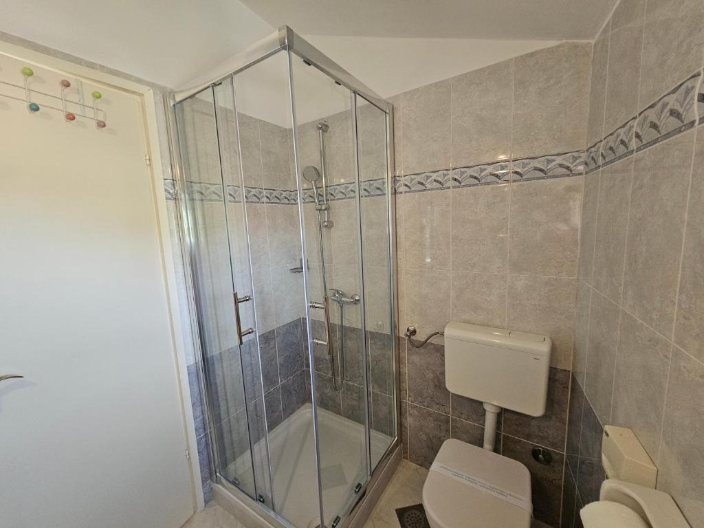 Kúpeľňa v ubytovaní Appartment Daniela Funtana