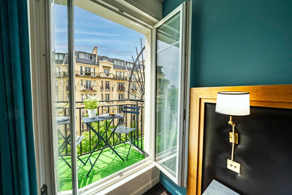 Hôtel Le Cercle Tour Eiffel - Resim 20