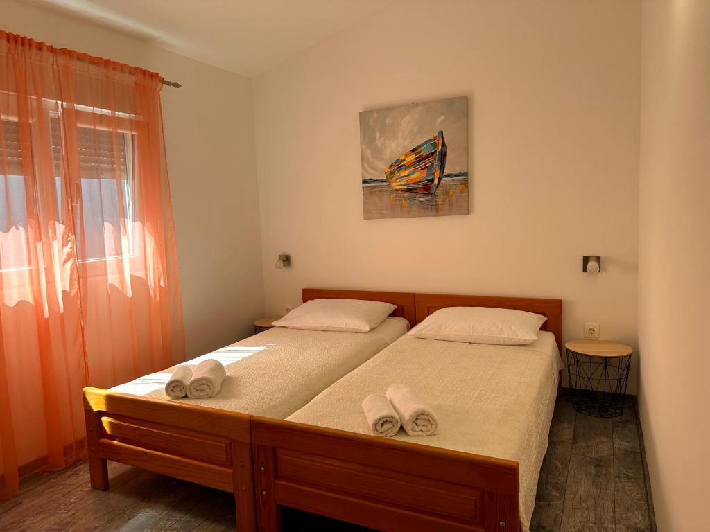 Postel nebo postele na pokoji v ubytování Holiday Home Pakoštane