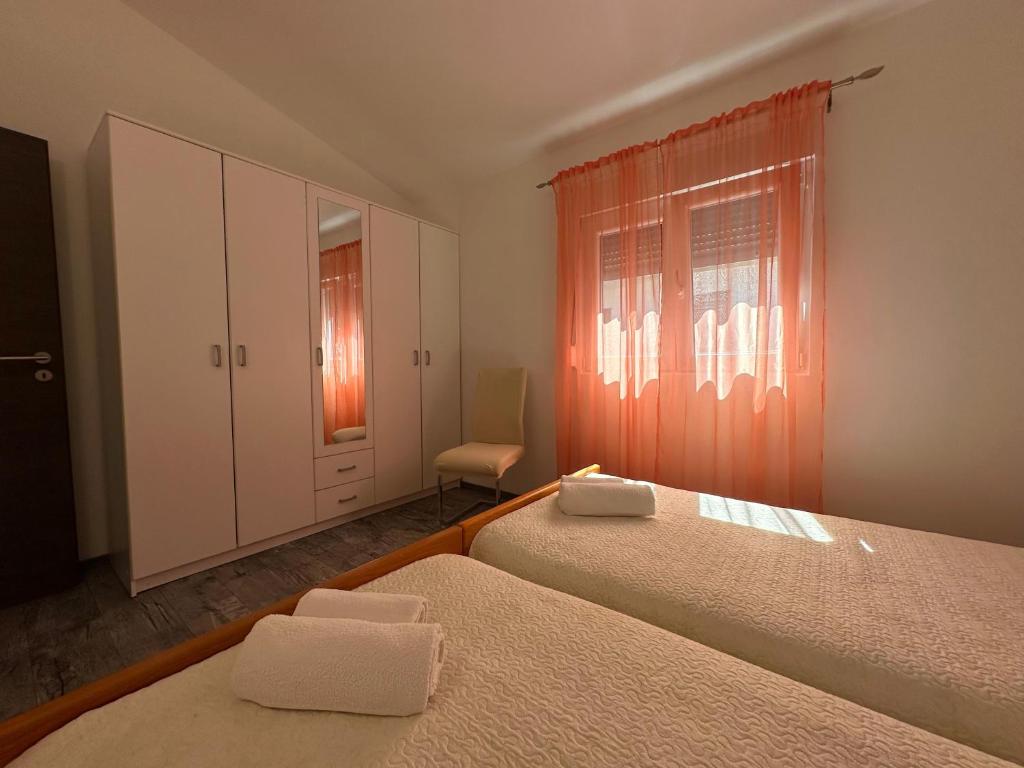 Postel nebo postele na pokoji v ubytování Holiday Home Pakoštane