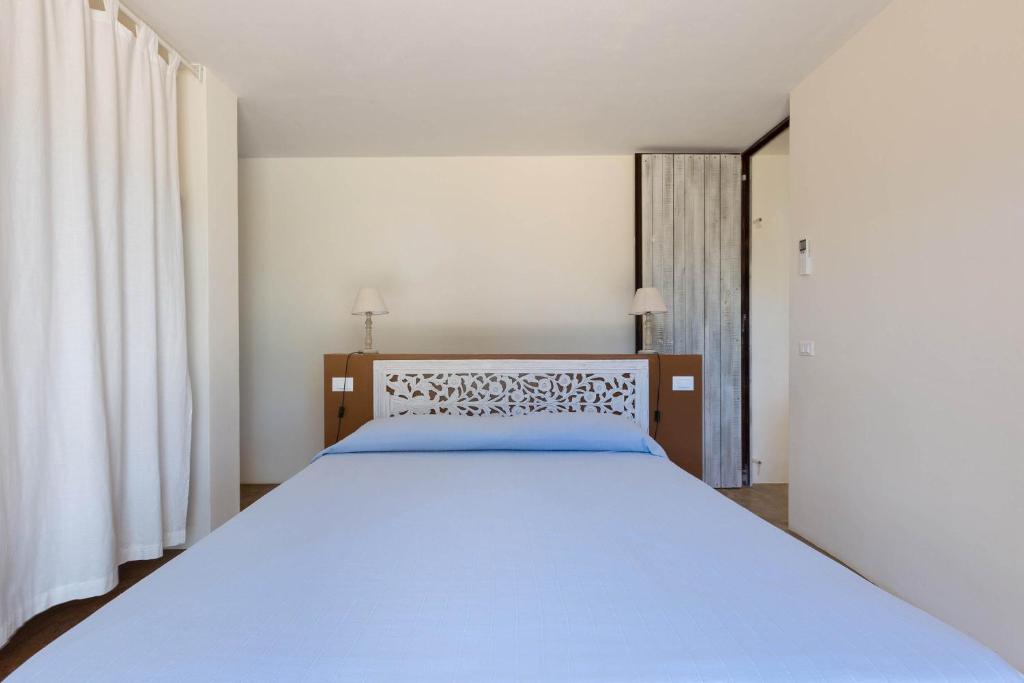 Łóżko lub łóżka w pokoju w obiekcie Villa Lisy by Perle di Puglia