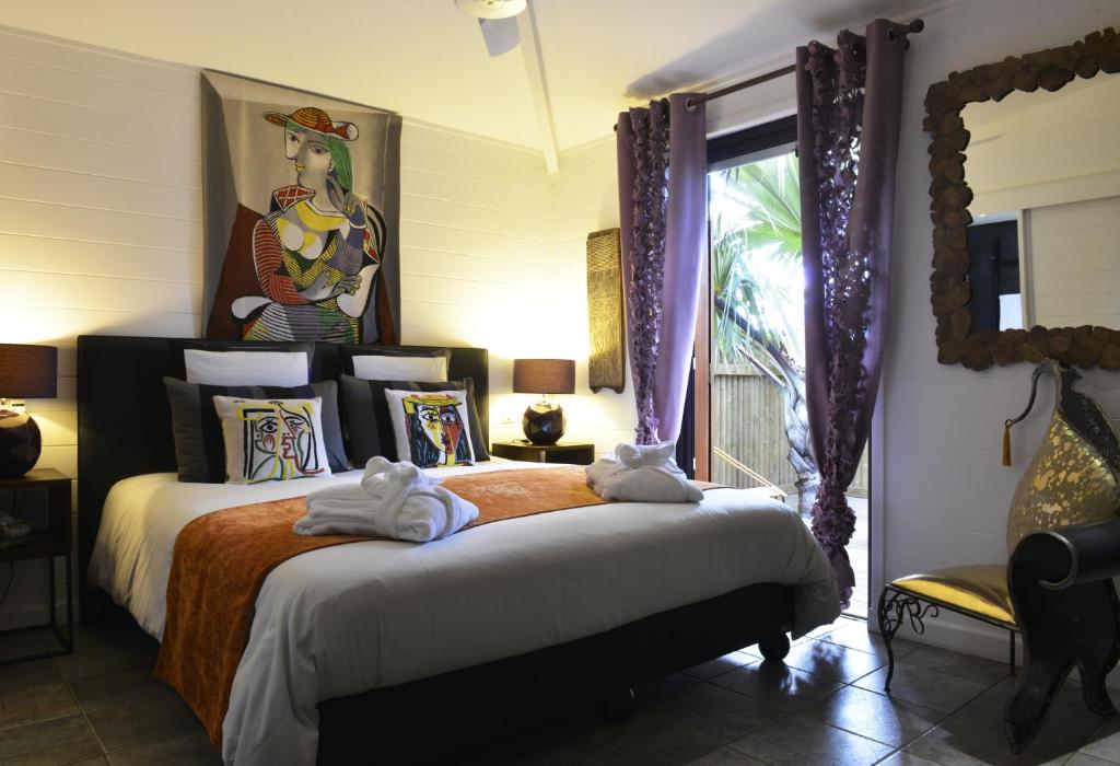 Postel nebo postele na pokoji v ubytování Villa Maido Luxe