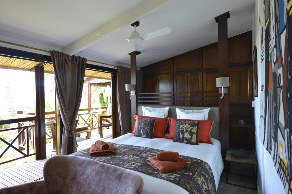 Postel nebo postele na pokoji v ubytování Villa Maido Luxe