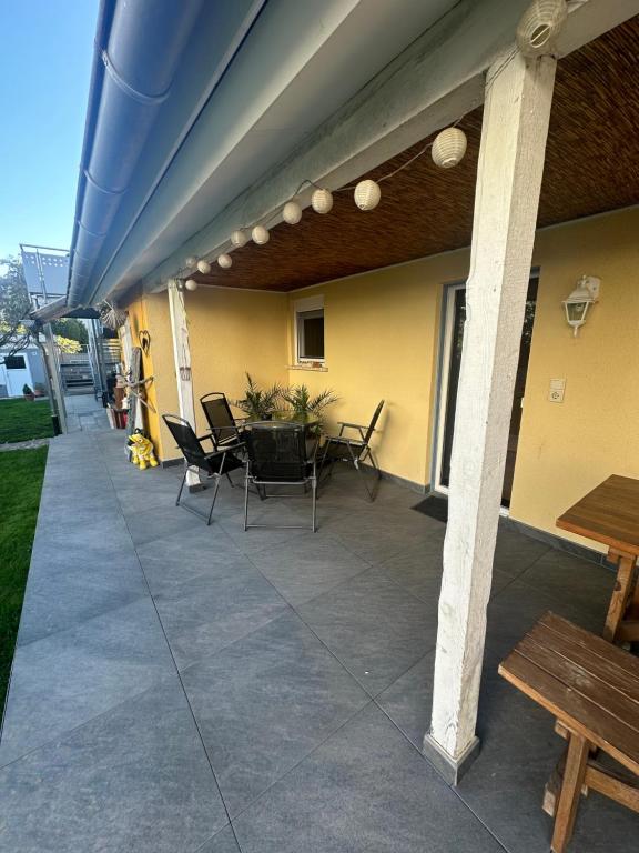Patio nebo venkovní prostory v ubytování Pension LeLiLa Rust - ex Gästehaus Milella