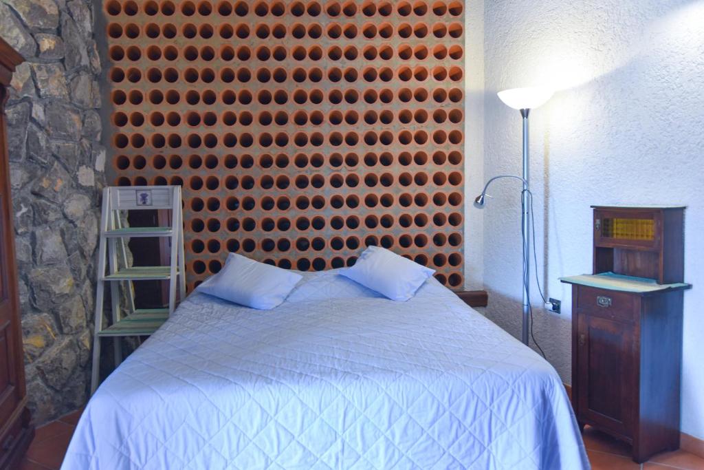 Łóżko lub łóżka w pokoju w obiekcie Apartments Villa Vosilla