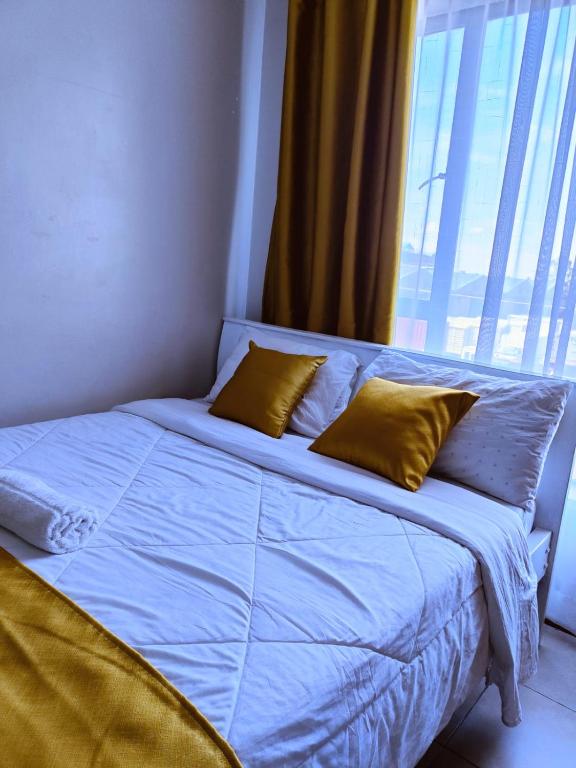 Postel nebo postele na pokoji v ubytování Baibai Homes Rm 204 &114
