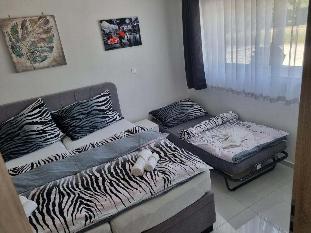 Postel nebo postele na pokoji v ubytování APARTMÁNY I&V - Adults only