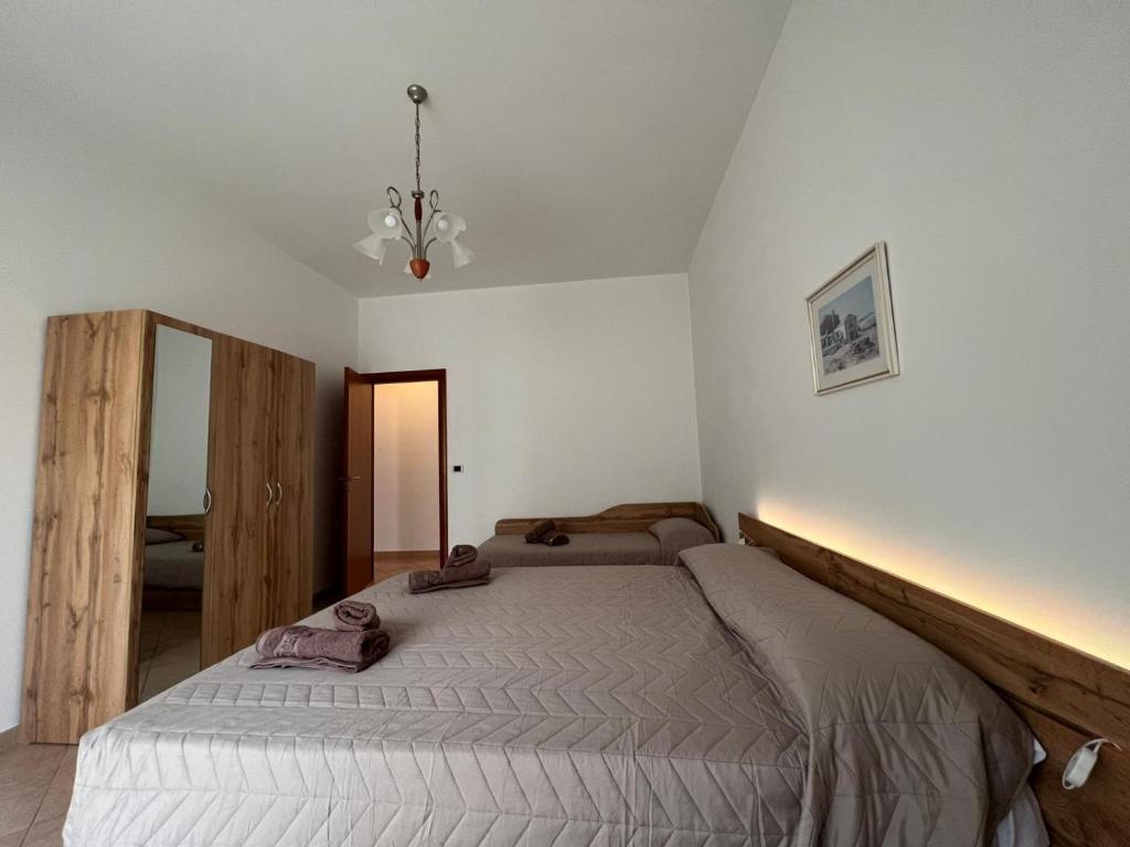 Ένα ή περισσότερα κρεβάτια σε δωμάτιο στο Cave House Castellana Grotte