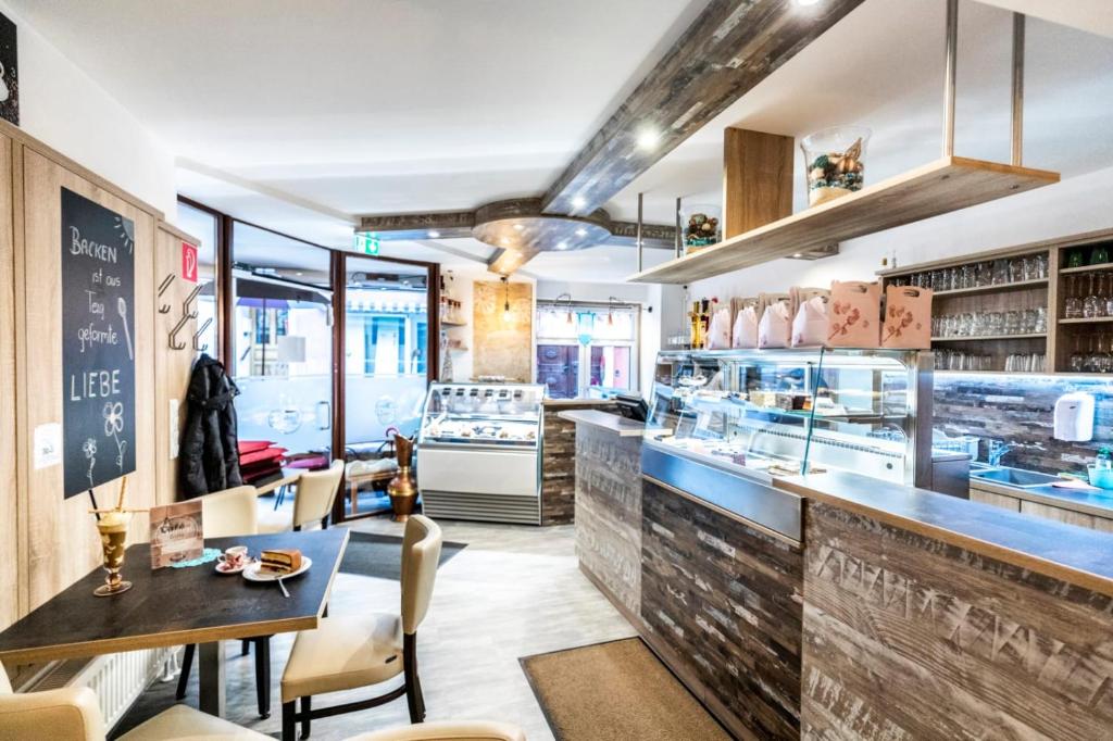 Kuchyň nebo kuchyňský kout v ubytování Apartment Crema