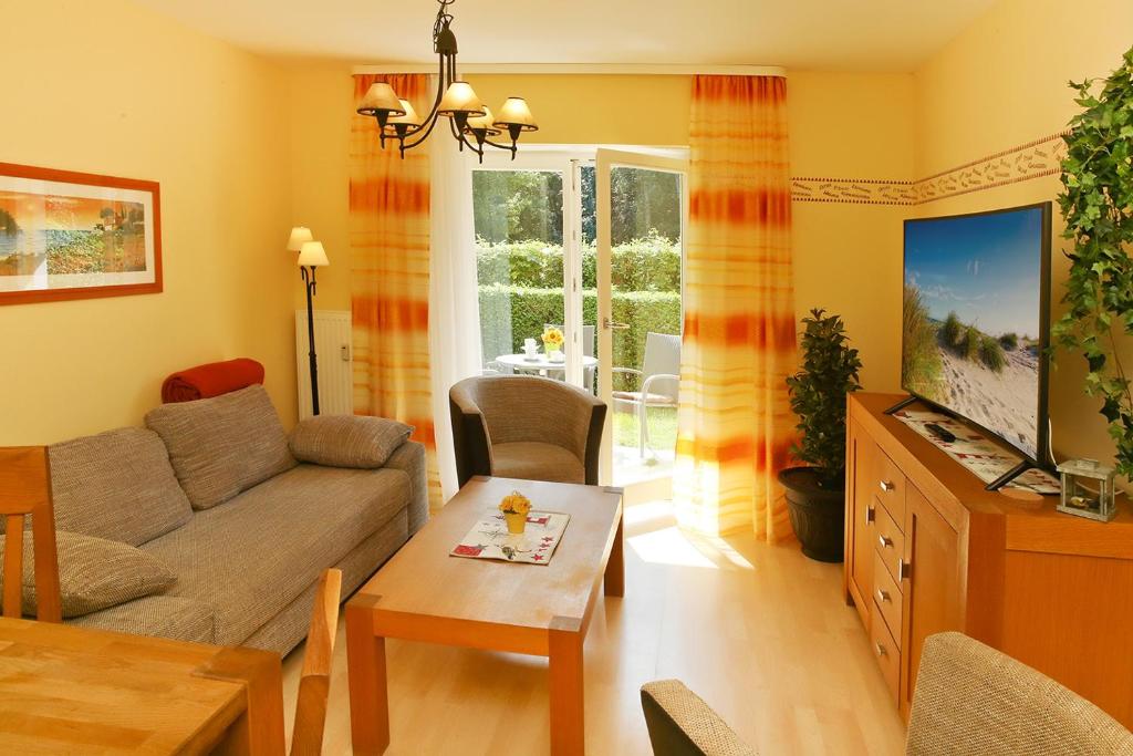 TV/trung tâm giải trí tại Villa Laura Cottage Fewo 102