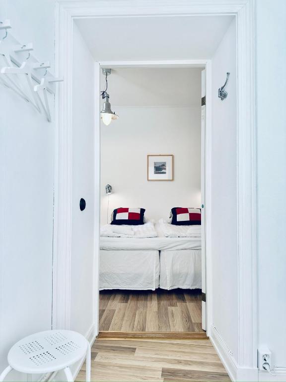 Postel nebo postele na pokoji v ubytování Wisby Residence